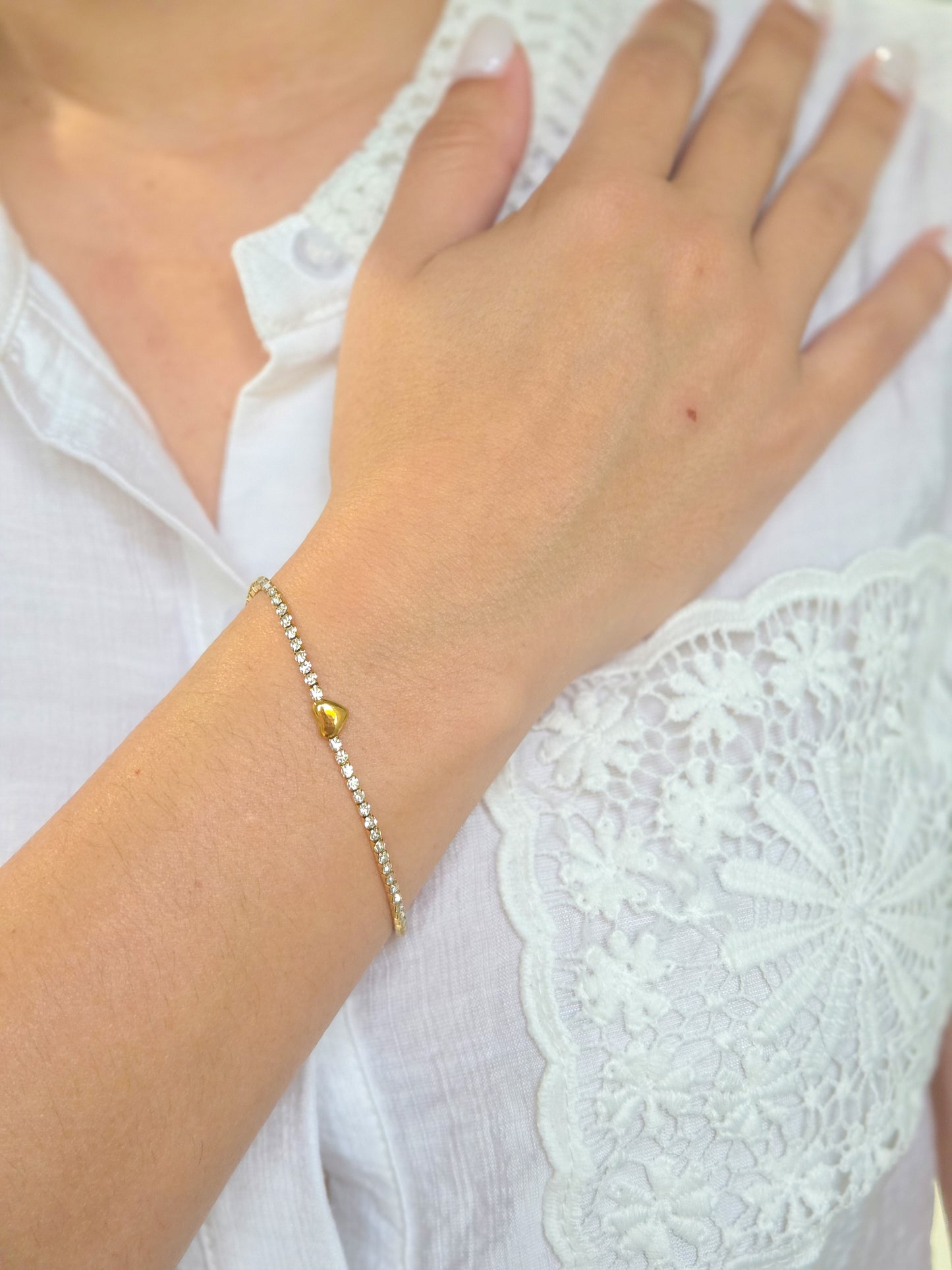 Pulsera corazón en tenis