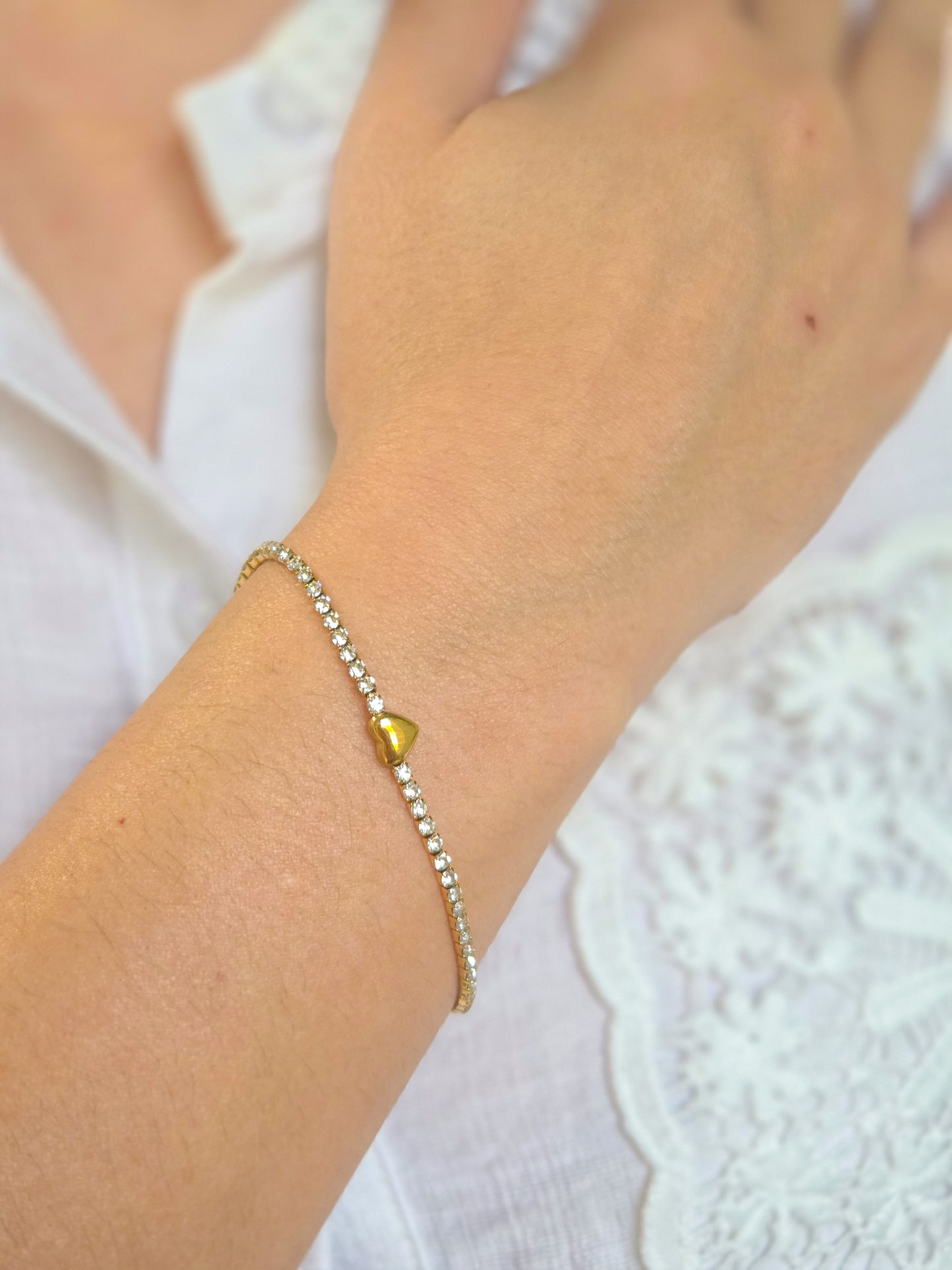 Pulsera corazón en tenis